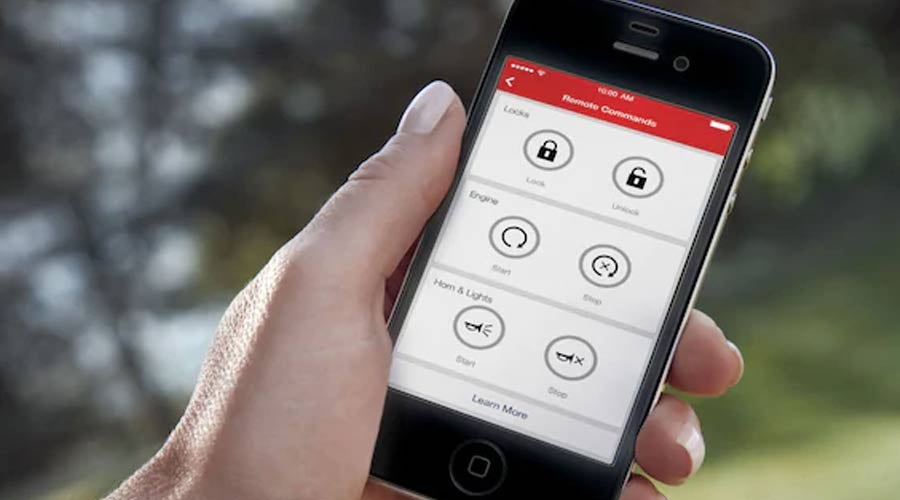 image of a man holding a tablet